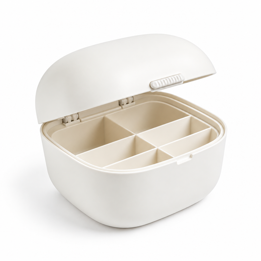 Ivory lidded pet toy organizer with interior dividers on white